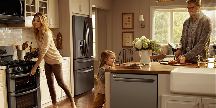 https://www.lincorpborchert.com/wp-content/uploads/2019/09/black-stainless-steel-kitchen-with-family.jpg